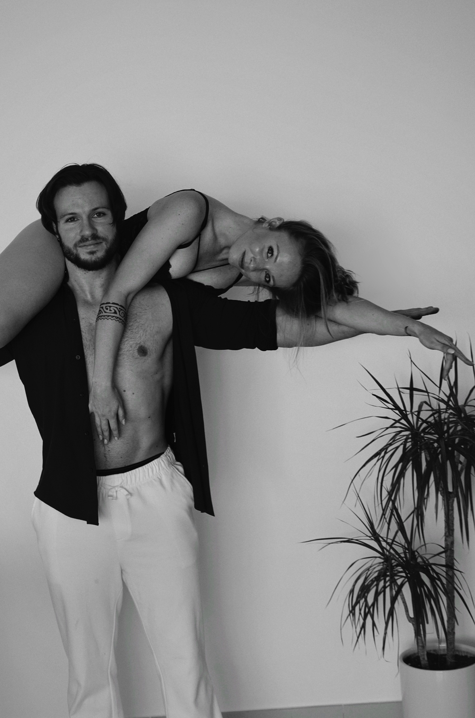 Couple embracing, black and white