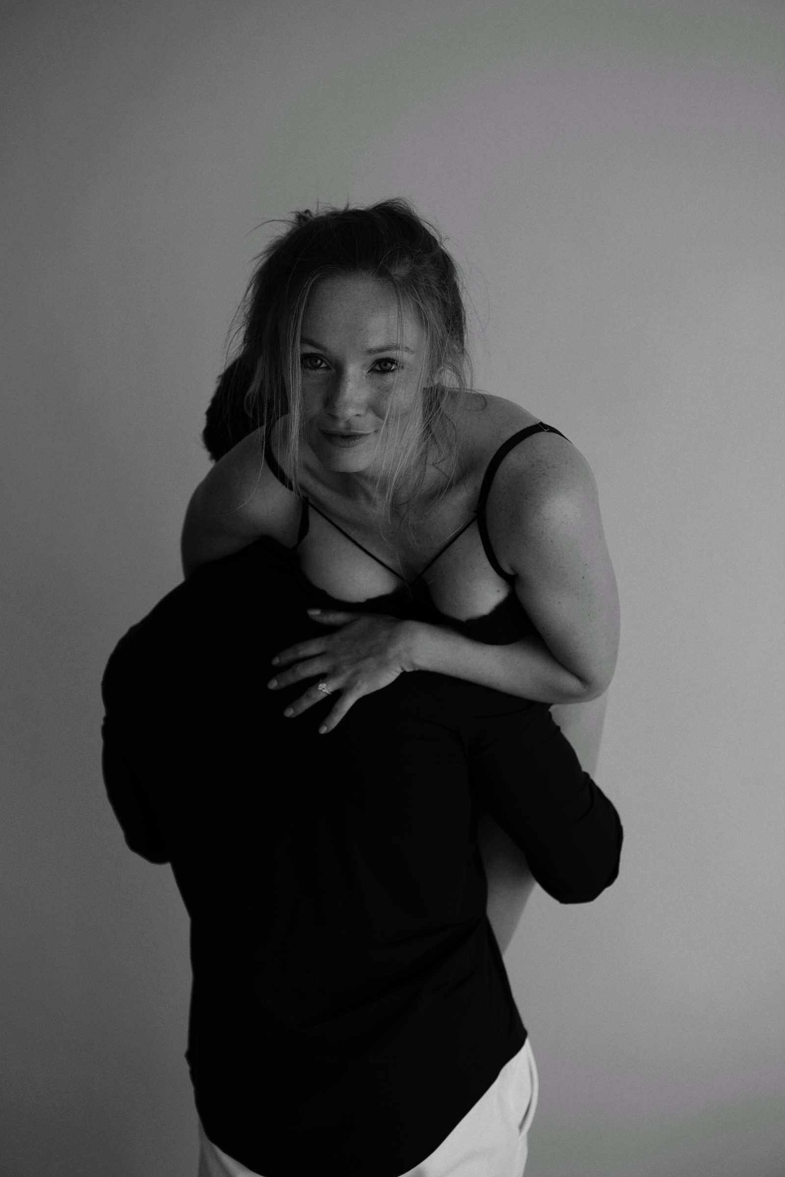 Woman lifted, black and white