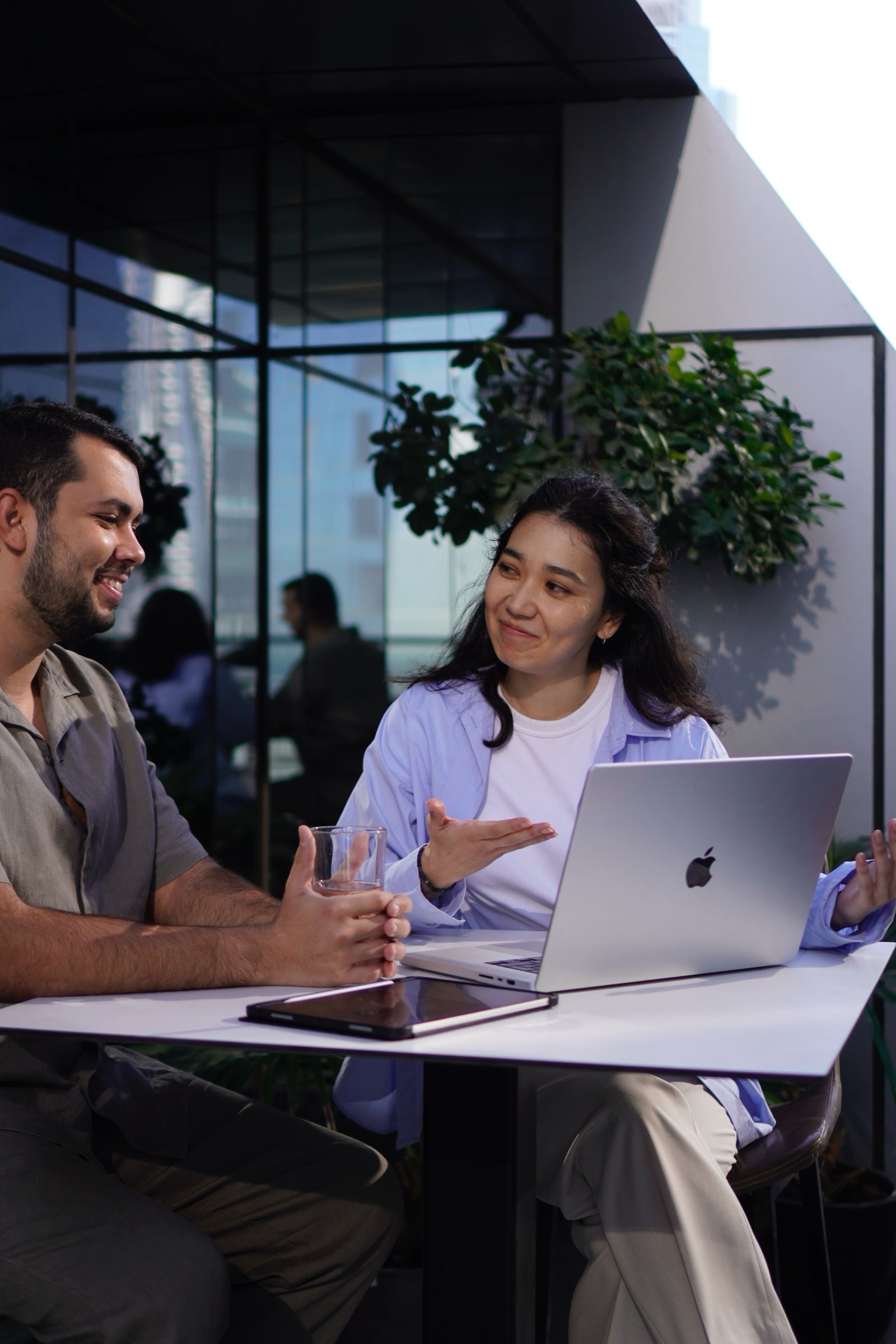 Team discussing around a laptop