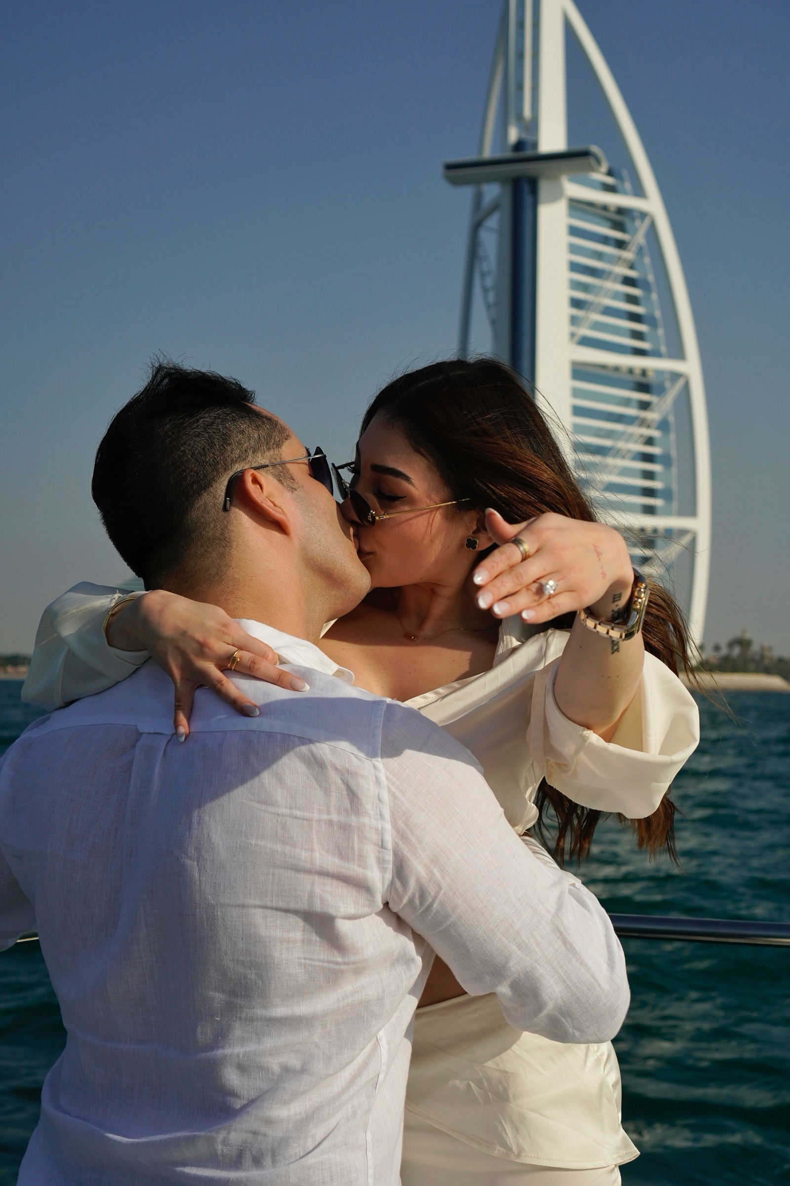 Couple kissing with the Burj Al Arab behind them
