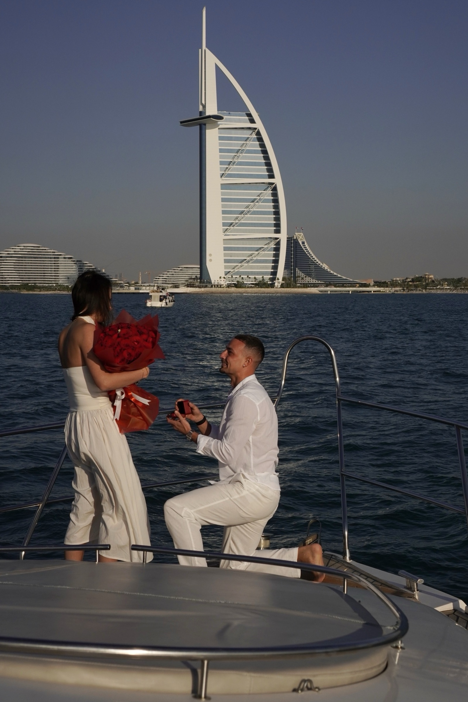 Proposal with red roses near the Burj Al Arab