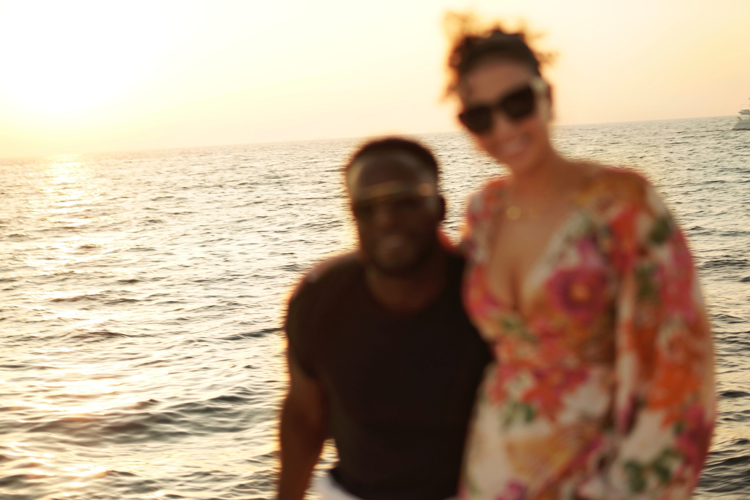 Couple portrait at sunset on the water