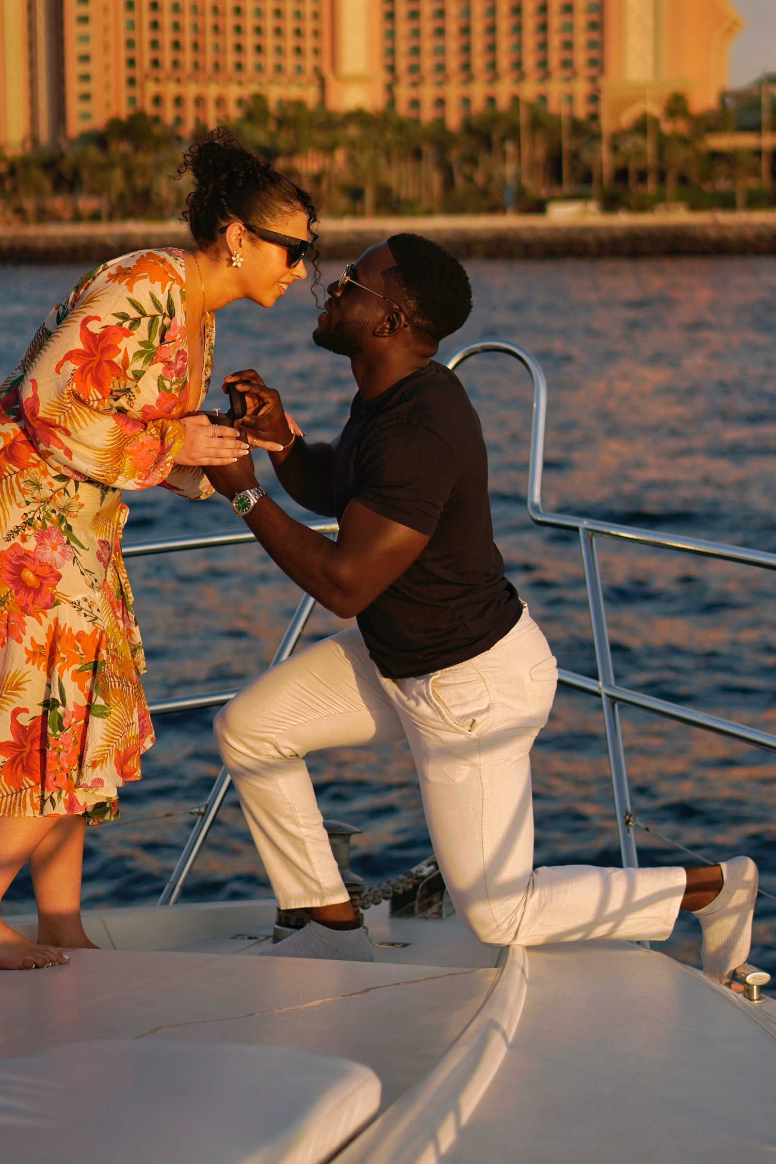 Couple during a yacht proposal by Atlantis